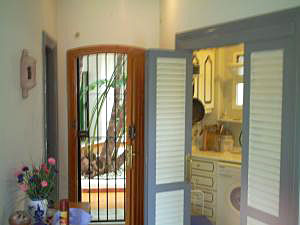 Entrance to the studio apartment and the separate kitchen